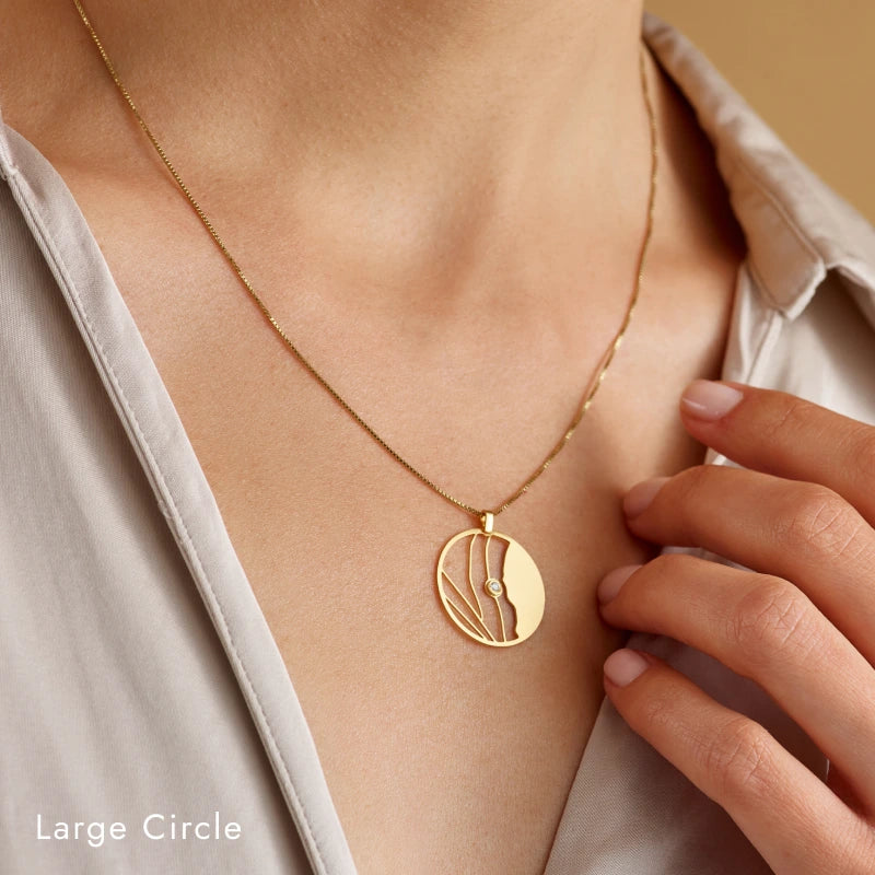 Gold plated circle map necklace with a diamond - Talia Sari