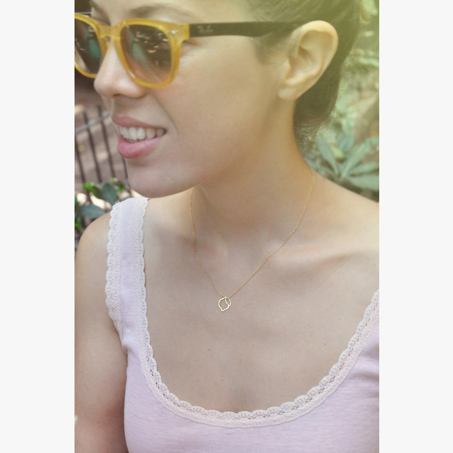 Lemon charm necklace by Talia Sari, a little reminder for what to do when life gives you lemons...