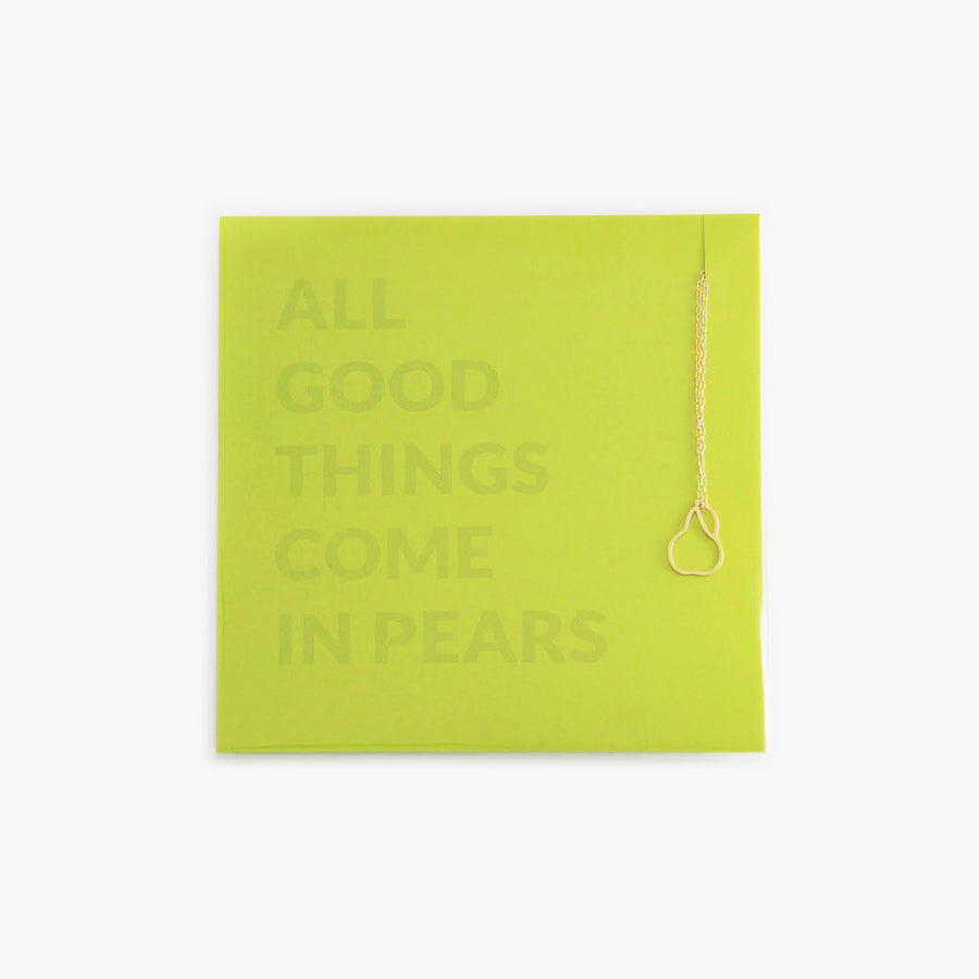 A minimalist pear charm on a gold-filled necklace by Talia Sari, because you know all good things come in pears...